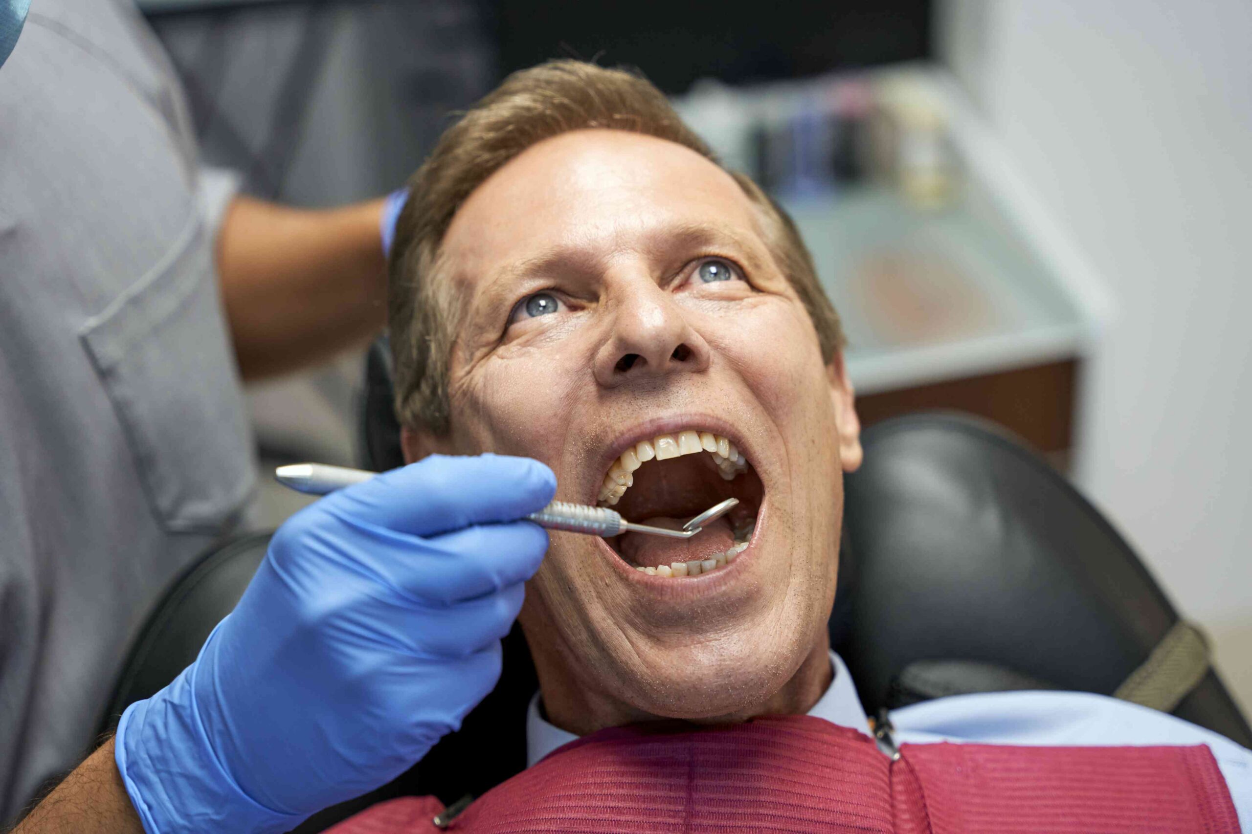 Patient receiving a dental exam.