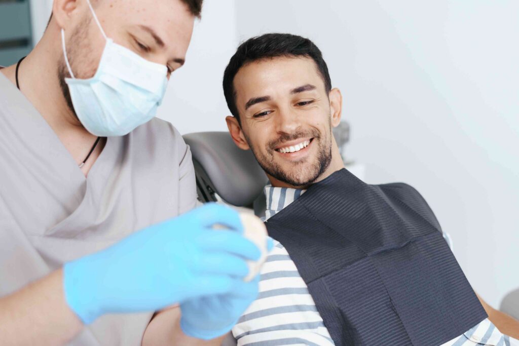 Dentist providing dental care to a patient.